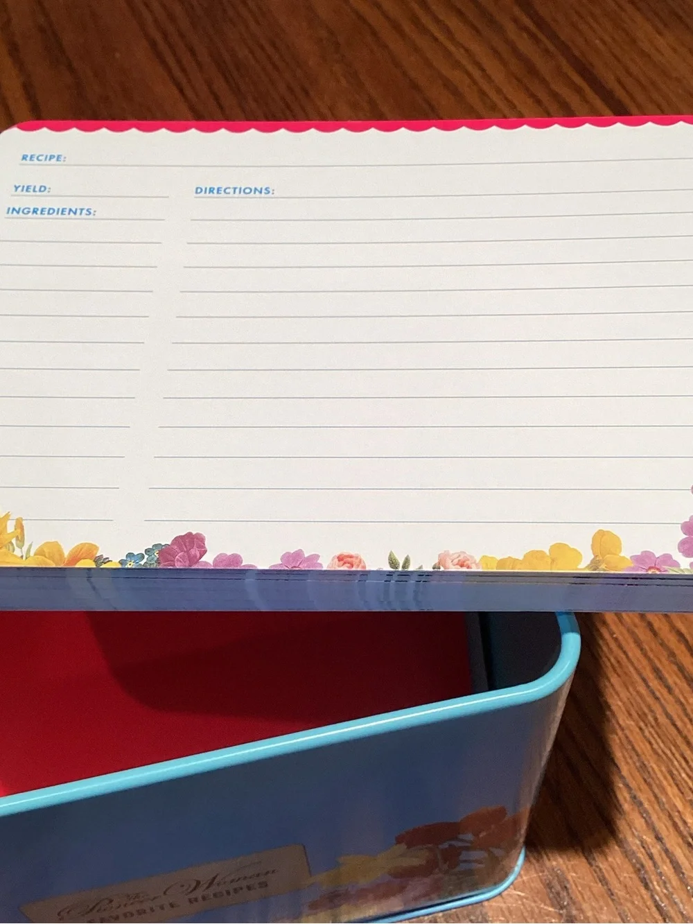 The Pioneer Woman Blue Tin with Red Lid and Floral Accents